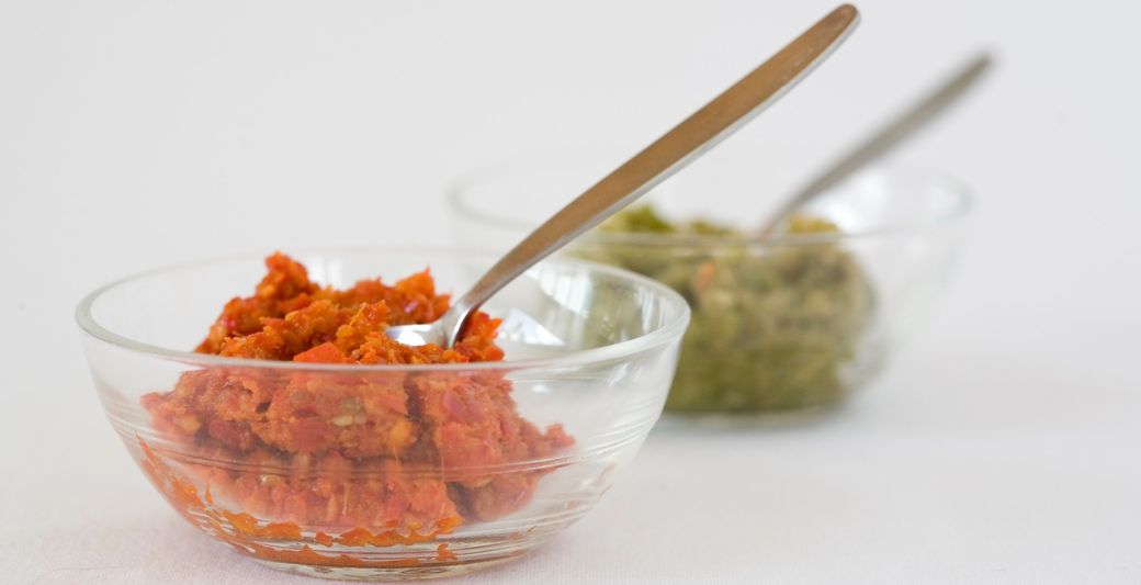 Red and green masala in glass bowl